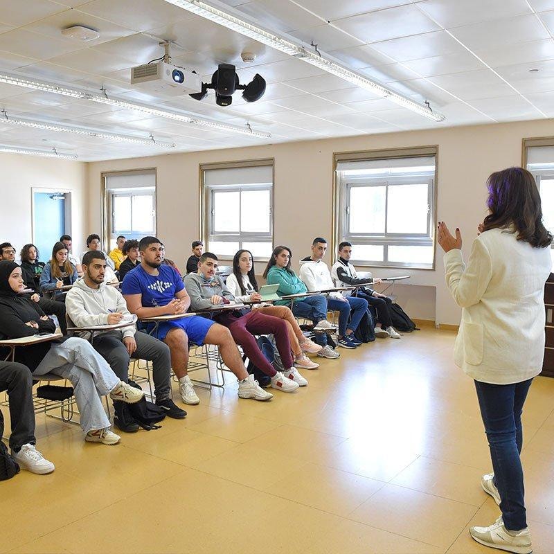 Instructor presenting to students in a classroom
