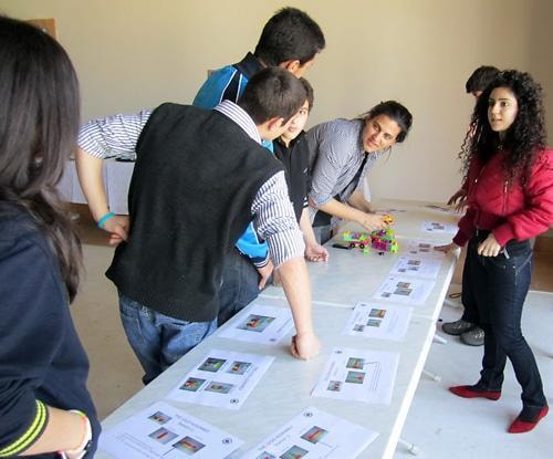 Young people collaborating during a hands-on learning activity